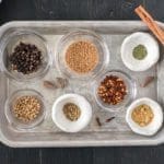 Corned beef spices in individual bowls.