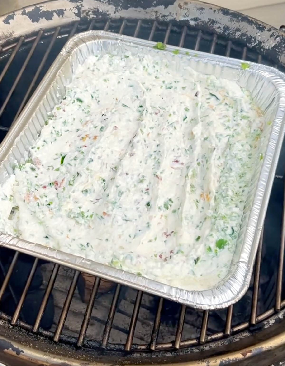 Cooked Jalapeno Popper Dip on the grill.
